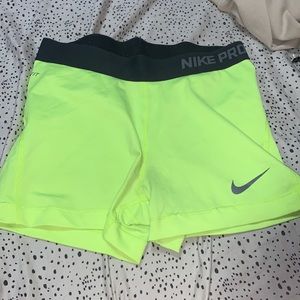 neon yellow and gray nike pro shorts, size medium